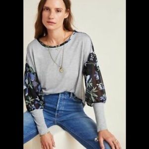 Anthropologies top Size S. “Tiny” brand.